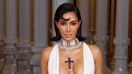 Kim Kardashian Stuns in Naked Dress as She Poses Next to Sea