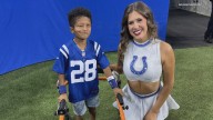 Colts cheerleader uses sign language to converse with deaf fan at his first game