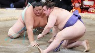 Ukrainian refugee who fled war wins top sumo wrestling competition in Japan