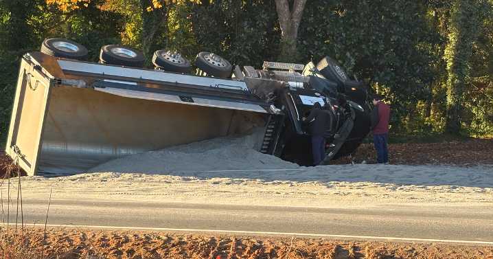 Overturned truck spills sand all over Leesville Road near RDU :: WRAL.com