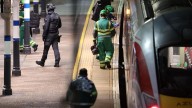 UK police say 10 people in hospital after train stabbing attack, 9 with life