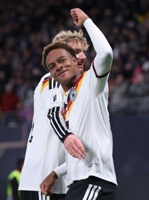 Germany and Netherlands lock up World Cup spots in style