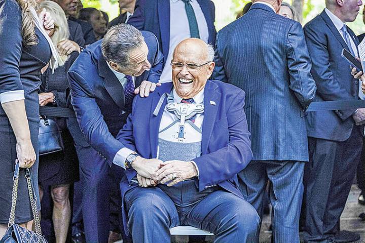 Trump pardons Giuliani and others involved in effort to overturn 2020 election