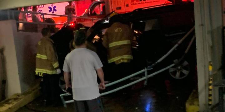 Vehicle crash seriously injures 1, damages water pipes to Makiki apartment