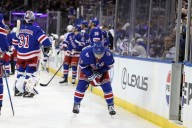 Adam Fox left game with apparent arm injury in Rangers scare