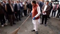 Uttarakhand CM makes surprise visit to Dehradun ISBT, sweeps premises over poor cleanliness