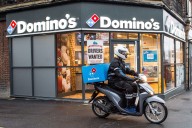 Boss of pizza giant Domino's steps down after boardroom strategy split