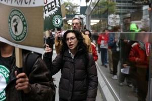 Starbucks baristas launch strike on chain’s ‘Red Cup Day’