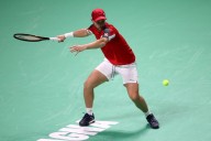 Tennis-Holders Italy ease past Austria to reach Davis Cup semi