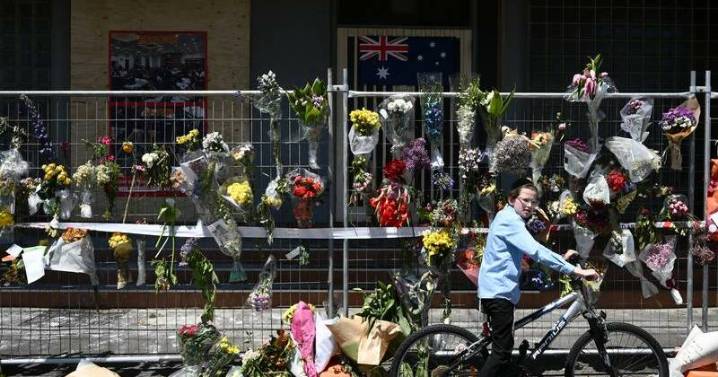 Premier backs down on protester face mask ban