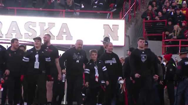 Husker football players and coaches fulfill dreams for Make