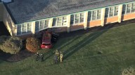 Car crashes into St. Laurence High School in Chicago suburb