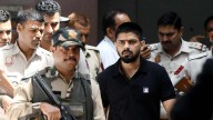 Who are the two most-wanted gangsters India arrested from Georgia, United States?