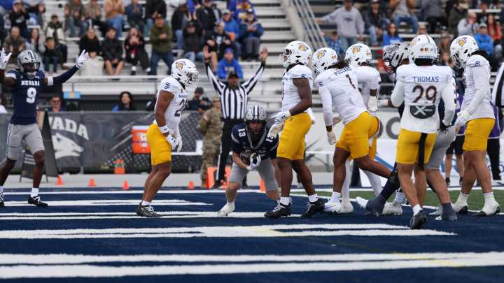 Nevada coach Jeff Choate addresses the media after beating San Jose St