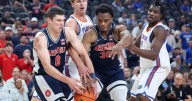 Freshman Koa Peat leads No. 13 Arizona to 93-87 win over defending champion, No. 3 Florida