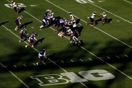 At Wrigley Field, Michigan's long-running Big Ten animosity takes a day off