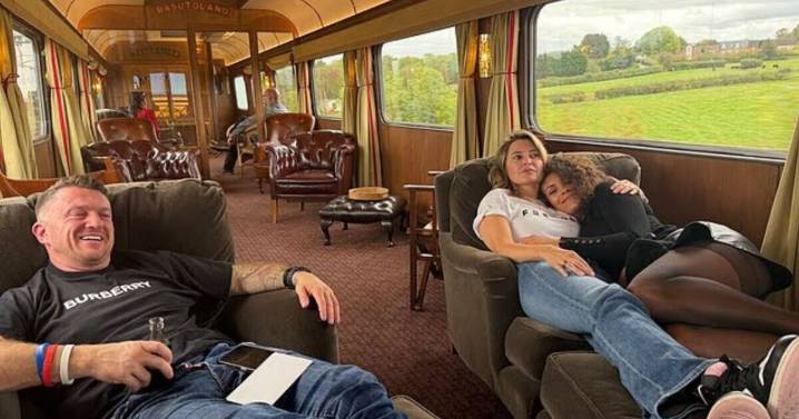 Holly Valance pictured lounging with Tommy Robinson as friends raise 'concerns'