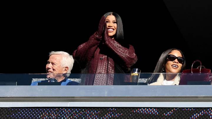 Cardi B supports Patriots WR Stefon Diggs next to Robert Kraft at Gillette