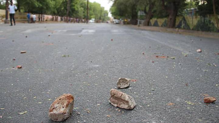 Four men allegedly pelted stones and damaged a private bus in Chaitanyapuri