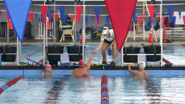 Mobile Masters swim coach honored with prestigious national award