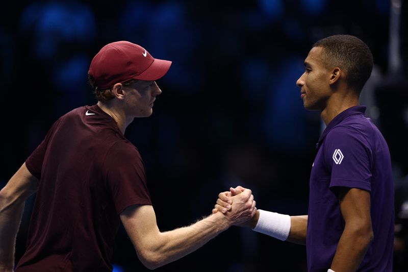 Tennis-Sinner storms past Auger-Aliassime to begin ATP Finals defence