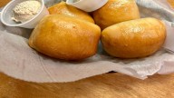 The Holiday Trick That Lets You Bring Texas Roadhouse's Iconic Rolls Home To Bake