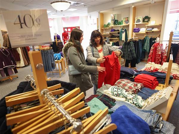 Shoppers chase deals, savor holiday traditions