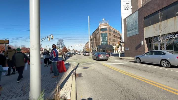 Neighbors rally at Mass Ave and College calling for safer street design