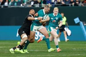 All Blacks sink 14-man Ireland 26-13 in Chicago Test