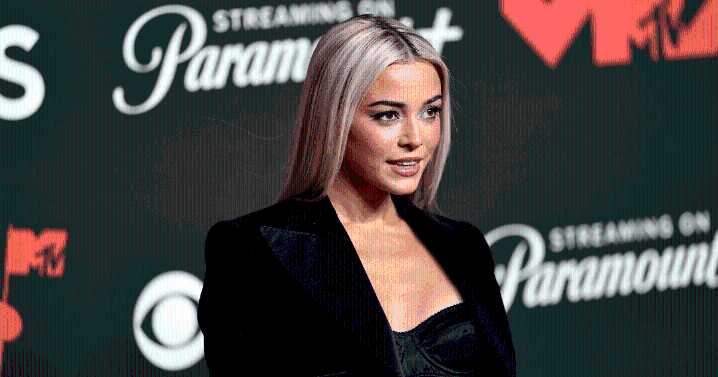 Livvy Dunne Poses With Leopard-Print YSL Bag in New Selfie