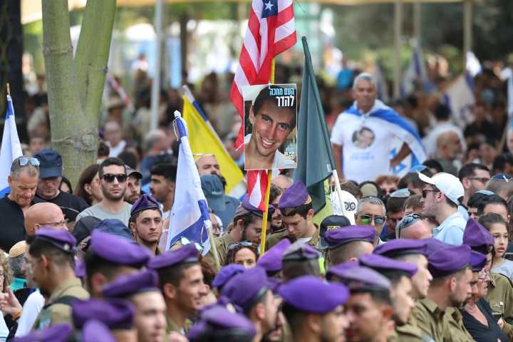 Tens of thousands of Israelis attend funeral of soldier  whose remains were held in Gaza for 11 years