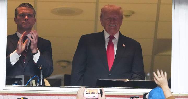 Trump gets boos, cheers as 1st president at NFL regular season game in 46 years