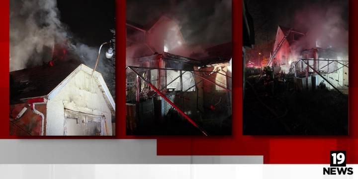Akron firefighters stay on scene of house fire