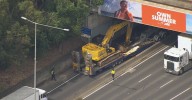 Batman Avenue: Major train, road delays after truck strikes two bridges near Melbourne CBD