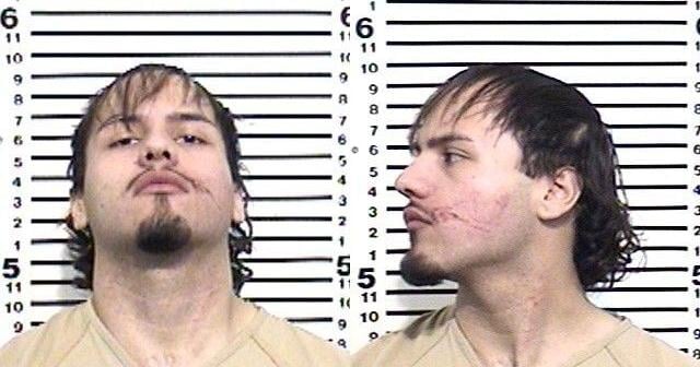 2 arrested after driver crashes vehicle into tree