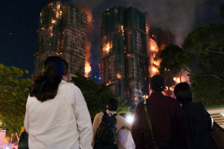 13 people killed as raging fire destroys Hong Kong high