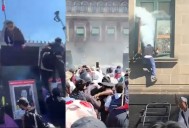 ¡Caos en el Zócalo! Encapuchados derriban vallas e irrumpen en Palacio Nacional tras marcha de ...