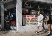 Uncertainty over federal food aid deepens as the shutdown fight reaches a crisis point