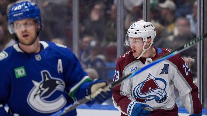 MacKinnon nets five points as Avalanche beat Canucks in overtime