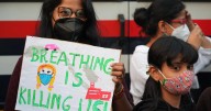 Air pollution in Indian capital Delhi closes schools, draws protests and a warning for the sick to escape