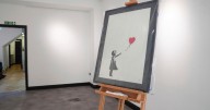 Man jailed for stealing Banksy’s ‘Girl with Balloon’ print in smash-and