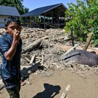 Indonesia, Thailand race to find missing as flooding toll tops 600