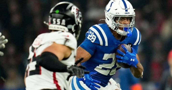 Taylor runs for 244 yards and 3 TDs for Colts in 31-25 OT win over Falcons in Berlin