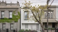 Fitzroy house: Downsizing couple replace derelict Victorian cottage with sleek contemporary home