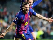 Lewandowski hat-trick helps Barca punish Real Madrid slip