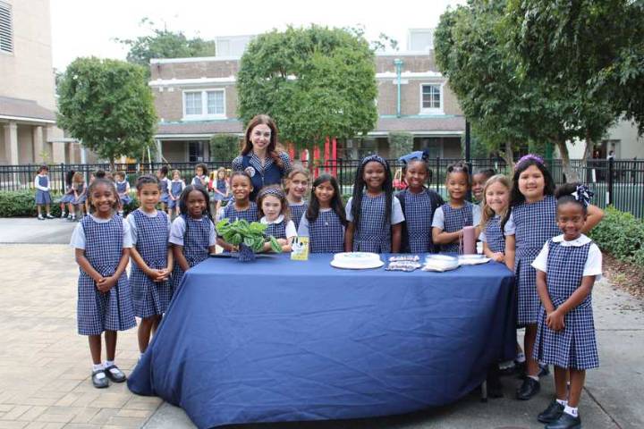 Ursuline first graders turn classroom business into playground upgrade