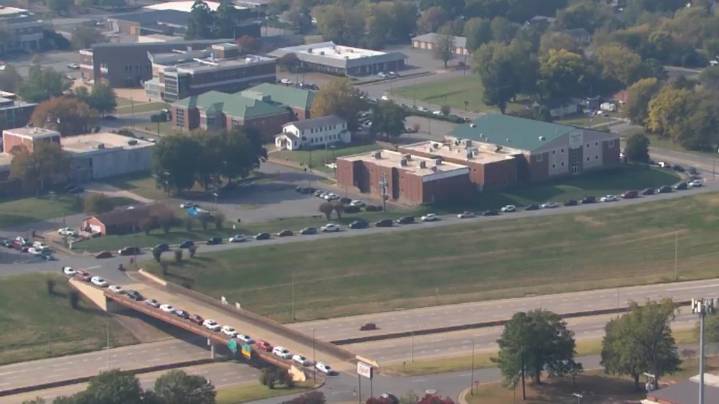 Long car line in Little Rock for annual pre