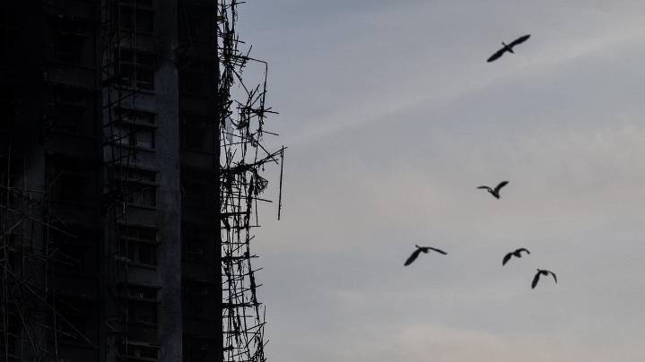 Bamboo scaffolding helped build Hong Kong's skyline, but a deadly fire may hasten its end
