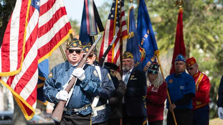 Spectator brave the cold at Venice Veterans Day program. See photos