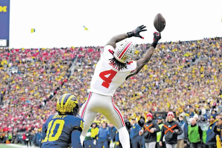 No. 1 Ohio State tops No. 15 Michigan for first time since 2019